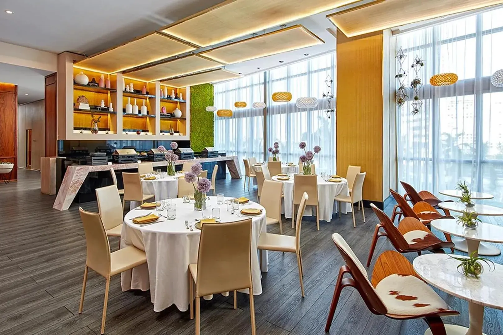 Hotel dining room with floor-to-ceiling glazing