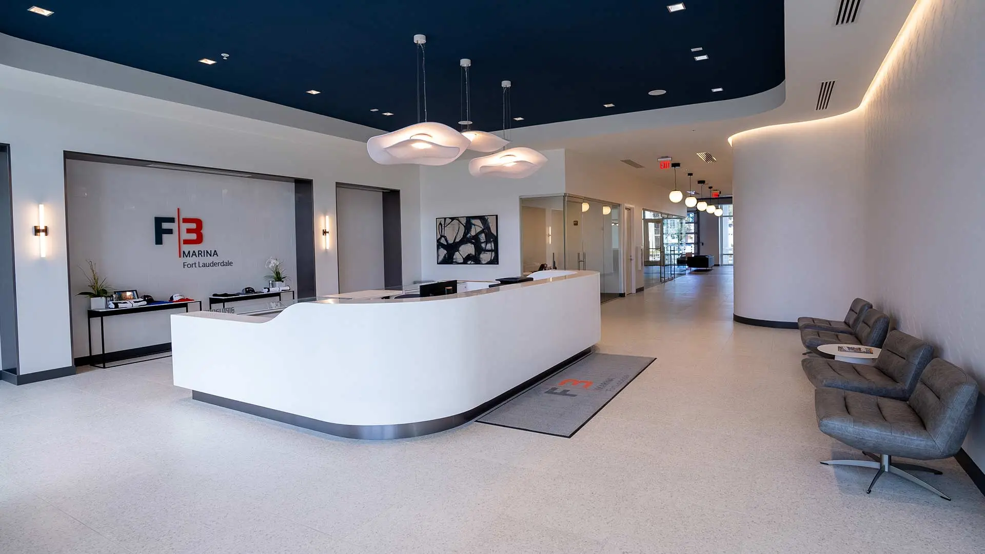 Completed commercial interior showing ceiling design, lighting, openings, and circulation