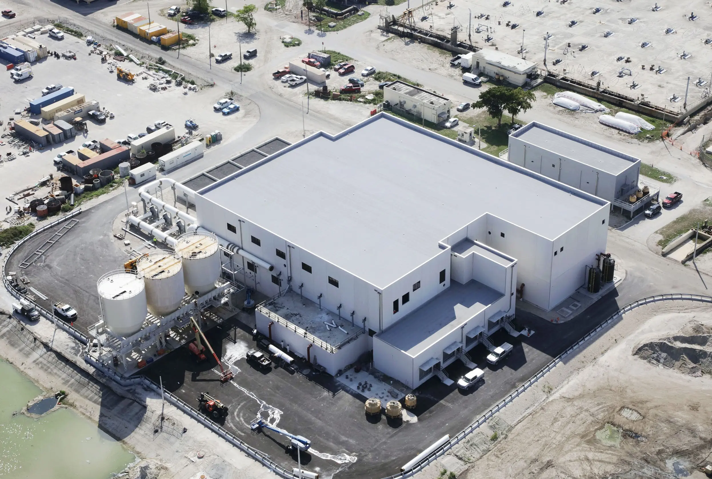 Aerial view of an industrial facility with coordinated site layout, buildings, and equipment areas
